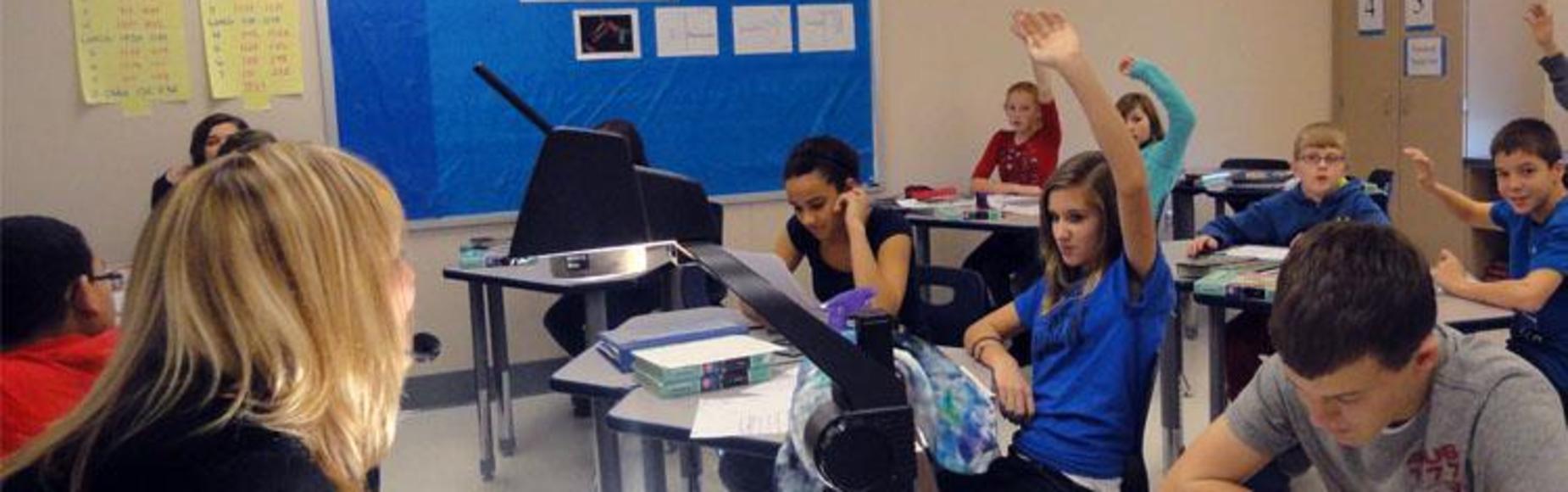 Student raising hand picture