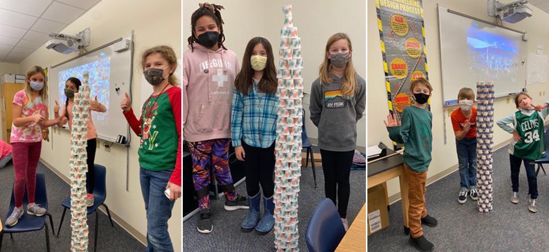students building cup towers