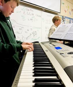 Student playing instrument