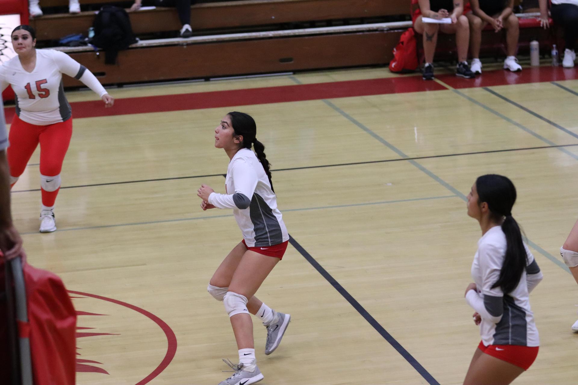 junior varsity girls playing volleyball against Liberty