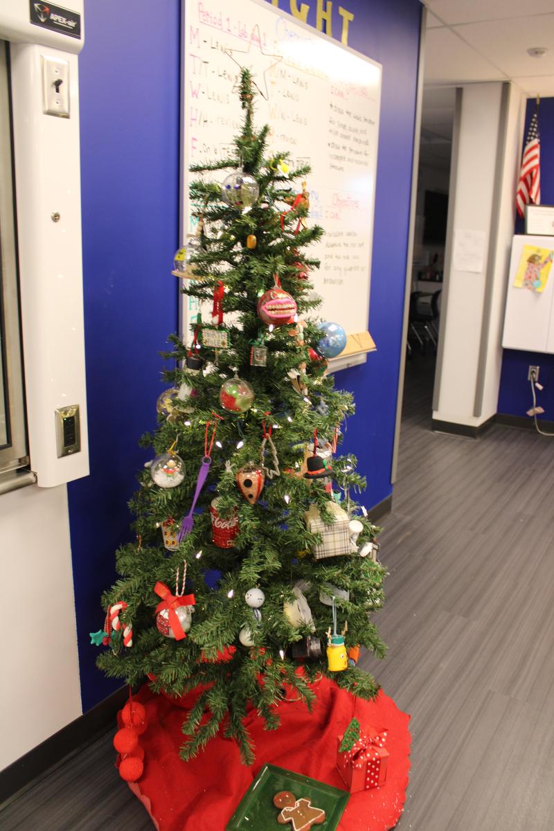 Christmas tree with ornaments depicting elements