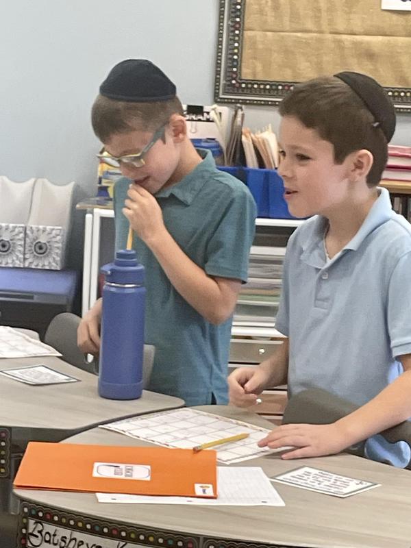 Third Grade Boys having fun playing SCOOT