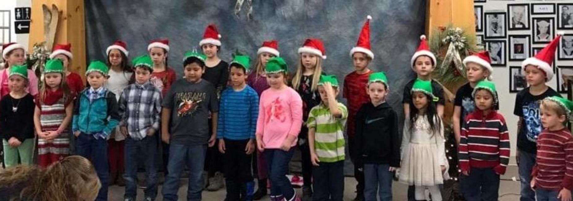 Hamer Elementary singing at the Mud Lake Museum Christmas Tree Lane