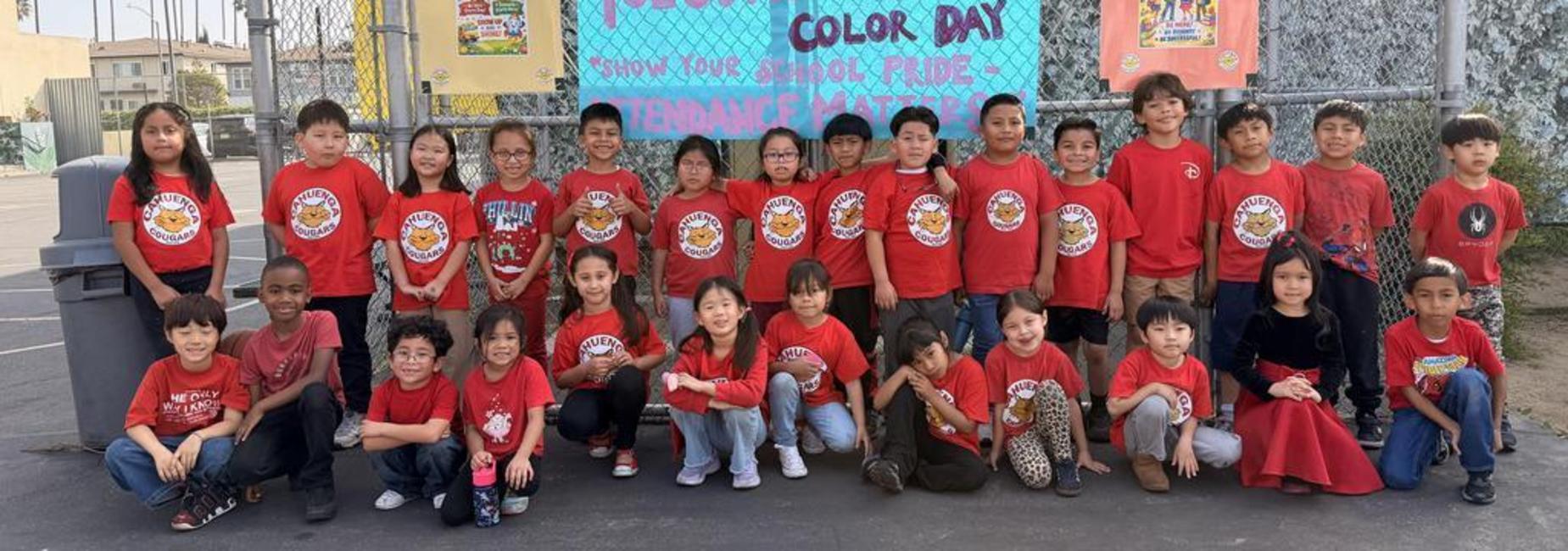 Students at the playground wearing Cahuenga's t-shirt