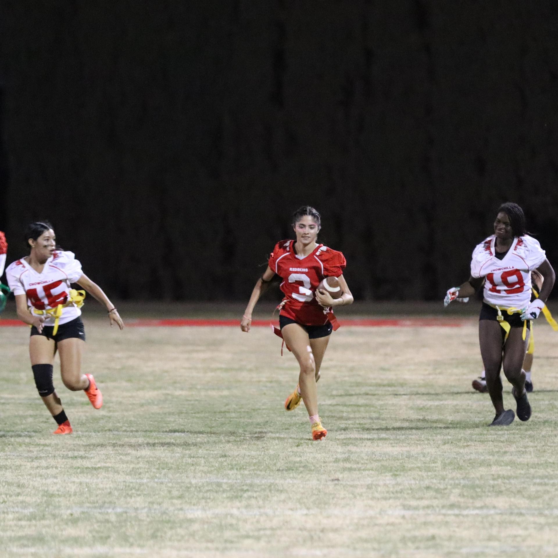girls playing flag football