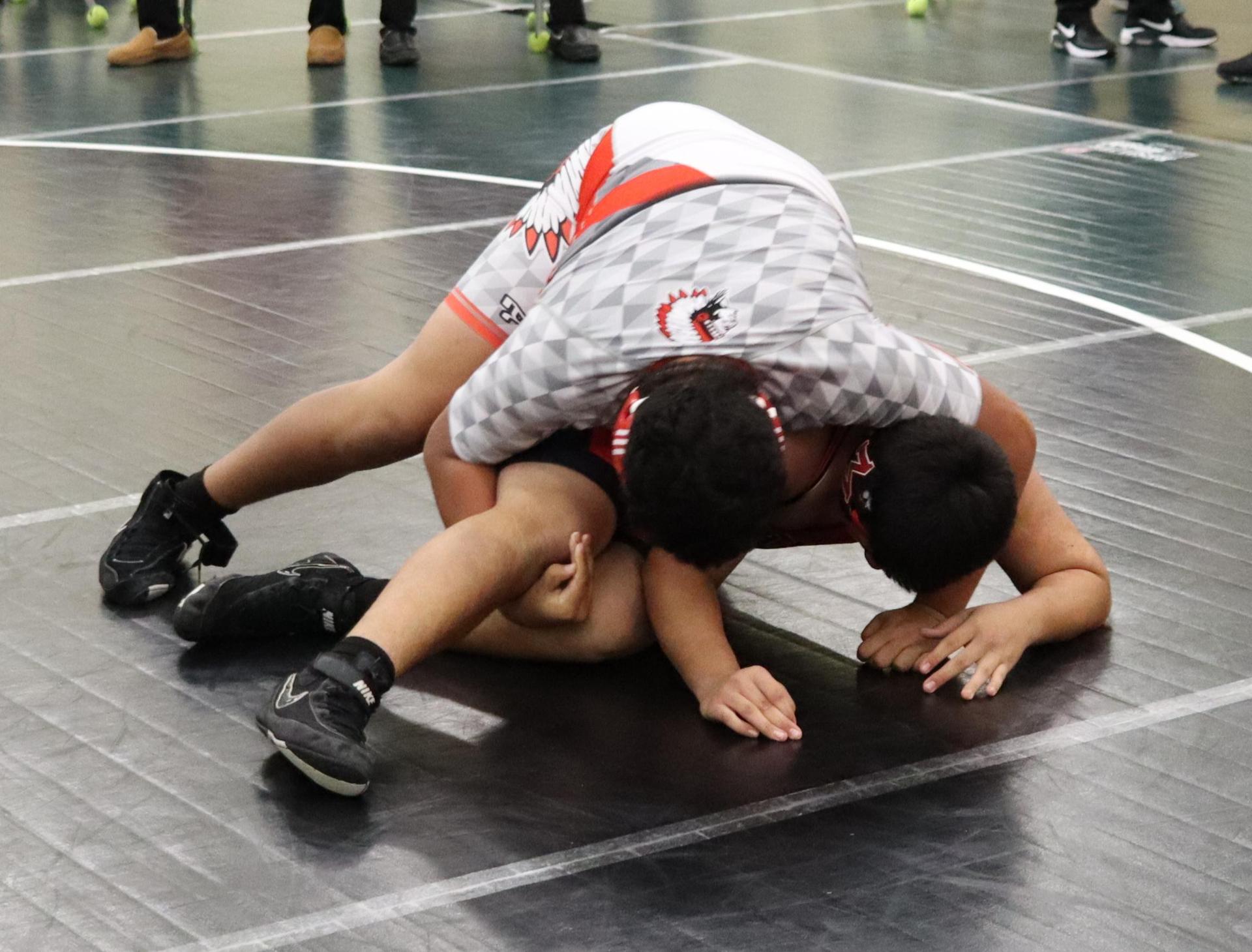 wrestlers in action at the Hawks invitational