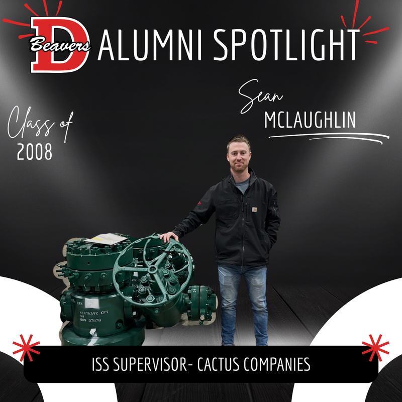 Sean McLaughlin Alumni Spotlight - Standing beside gas equipment