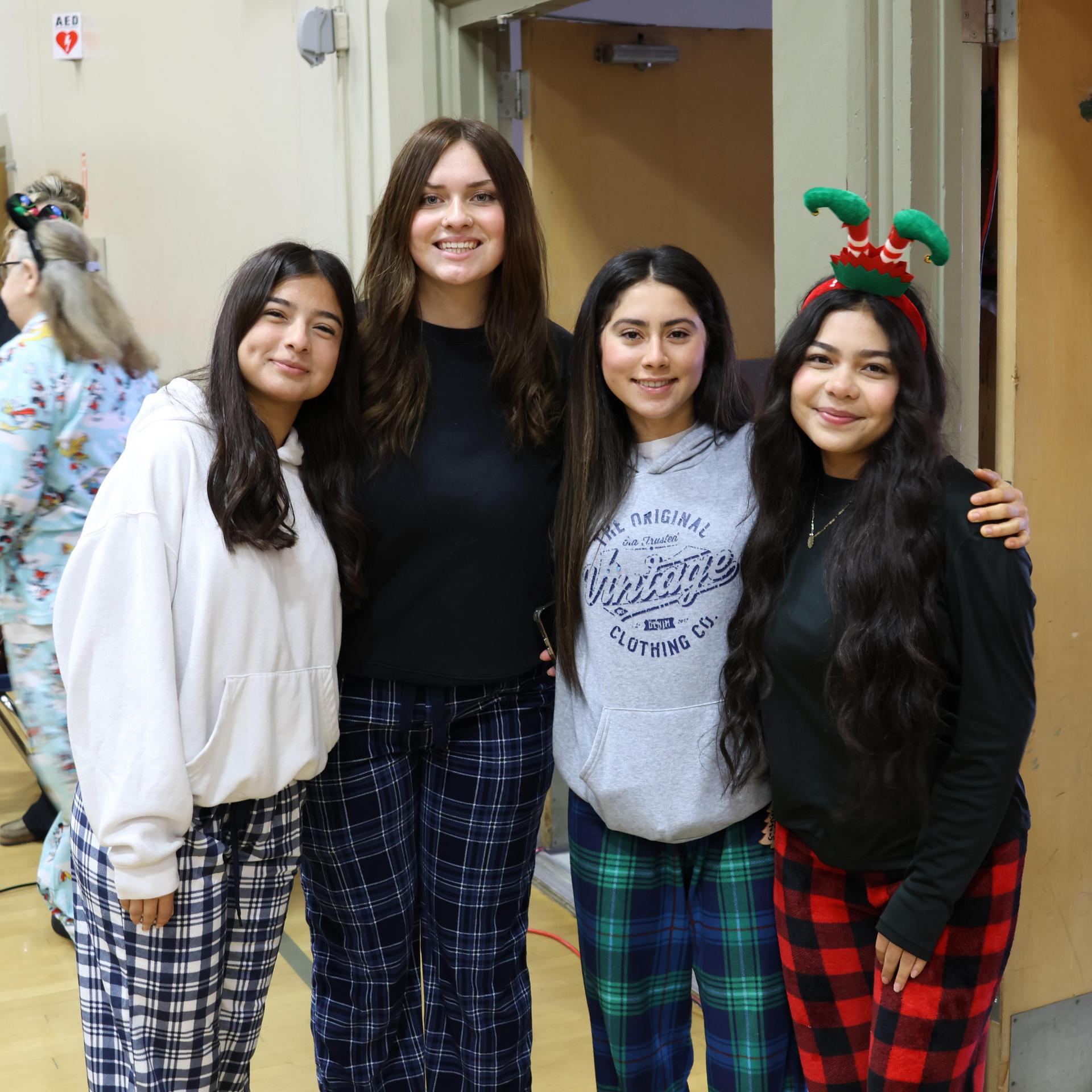 students and staff posing at the winter wishes rally