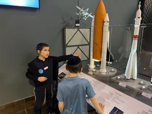 Boys explore the exhibits at the tellus museum