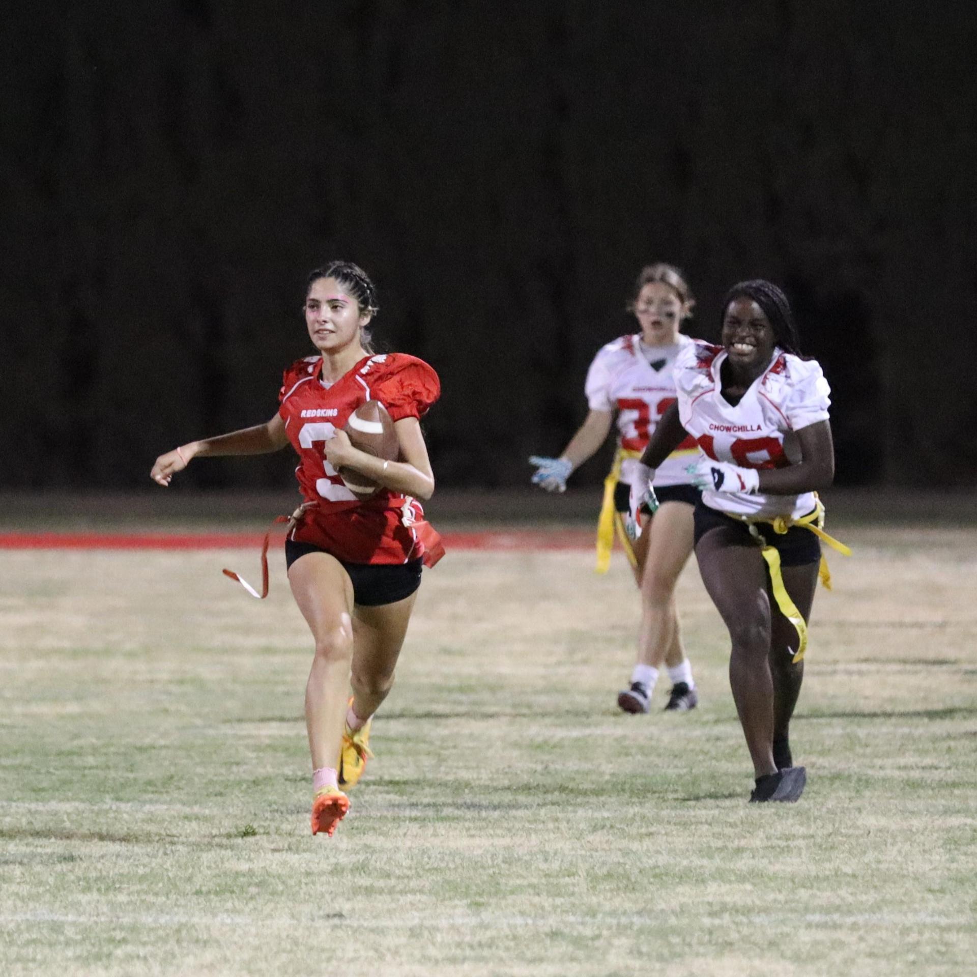 girls playing flag football