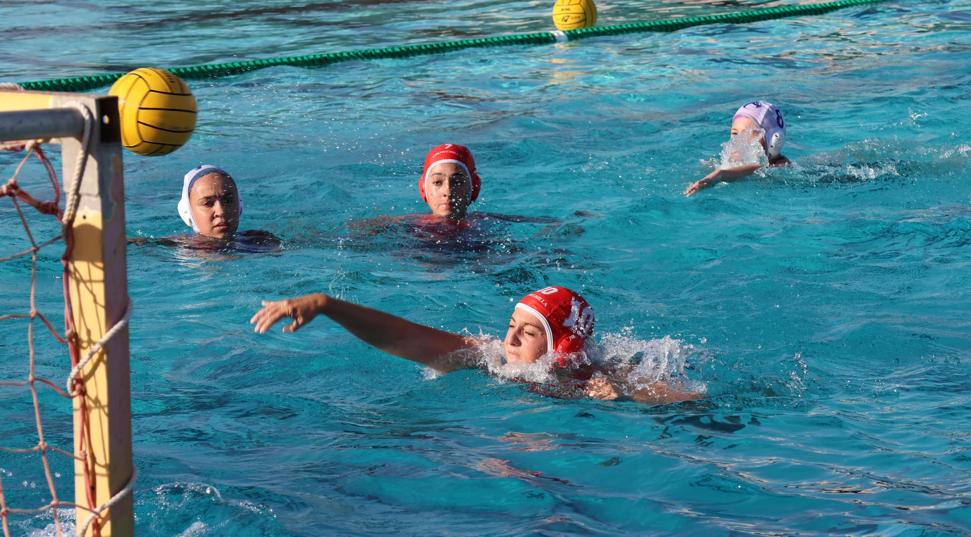 girls playing water polo against Sanger West