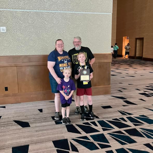 Michael and Family posing for a photo