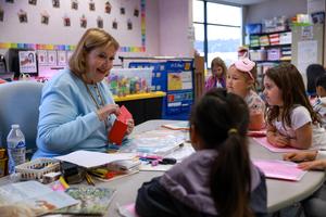 Mary Lou Harshman teaching students