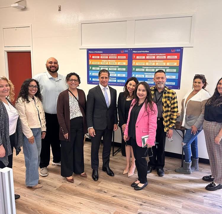 Staff group photo with Superintendent Alberto Carvalho