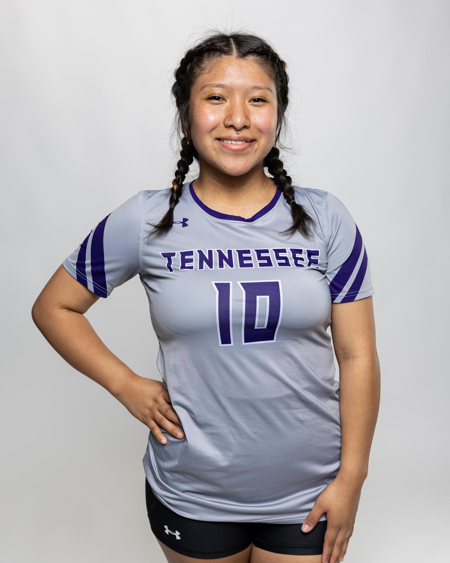 number 10 female volleyball player posing