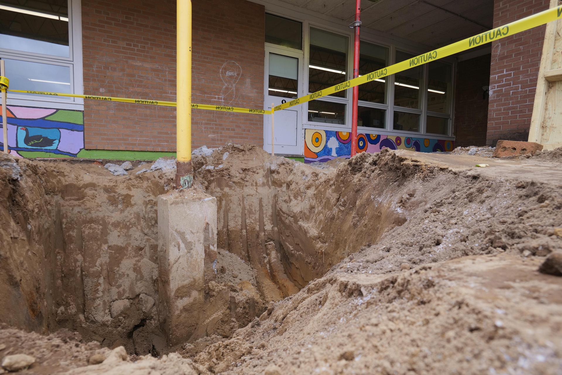 A pit dug behind the babcock building