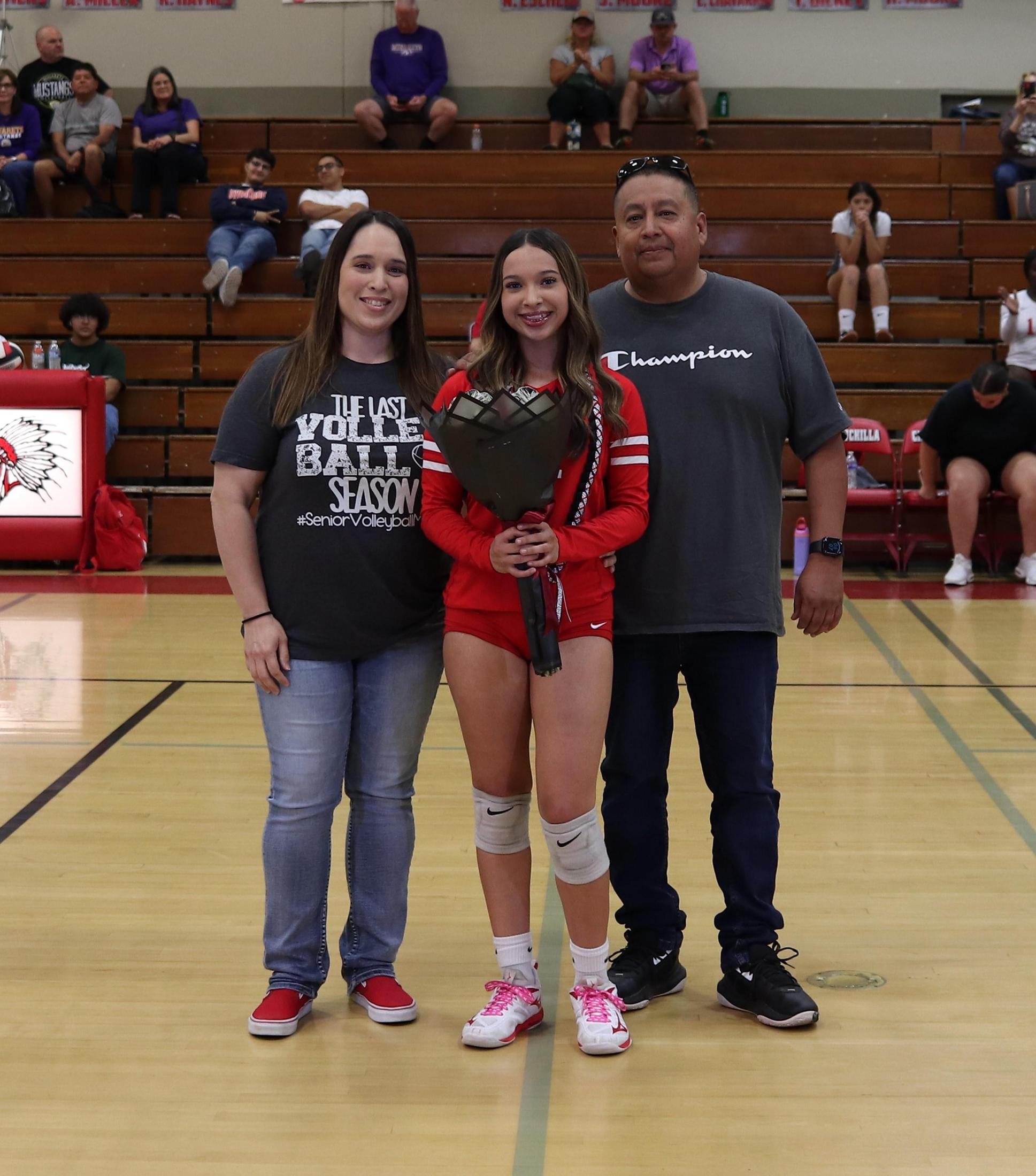 senior players and their escorts enjoying Senior Night