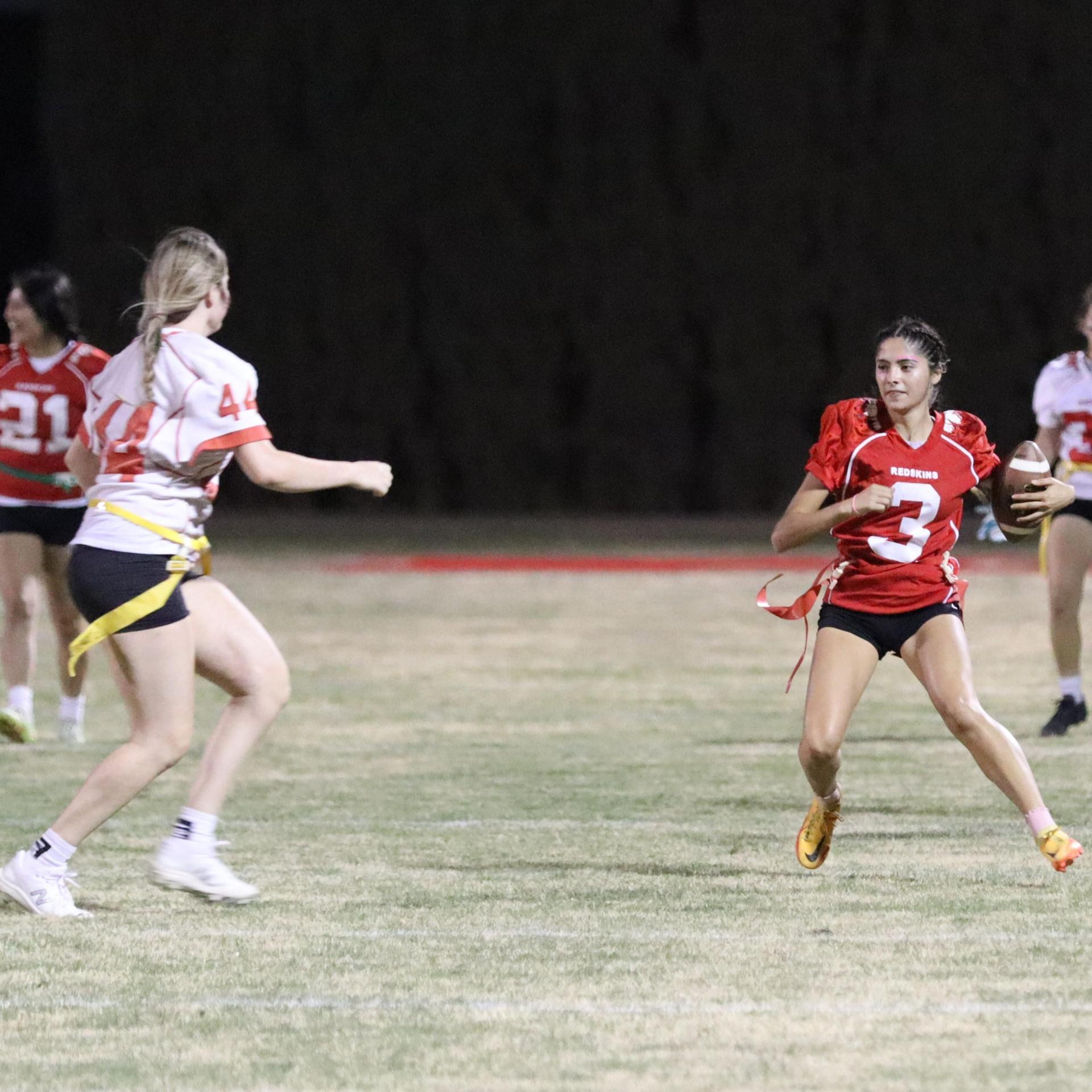 girls playing flag football