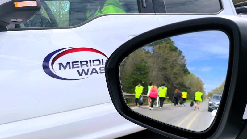 West Lauderdale High CTE students cleaning along a highway near the school