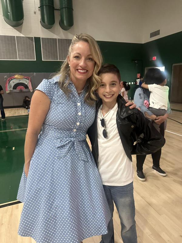 Mom and son at a school dance.
