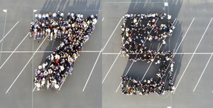 Students and Faculty stand in the shape of the number 75