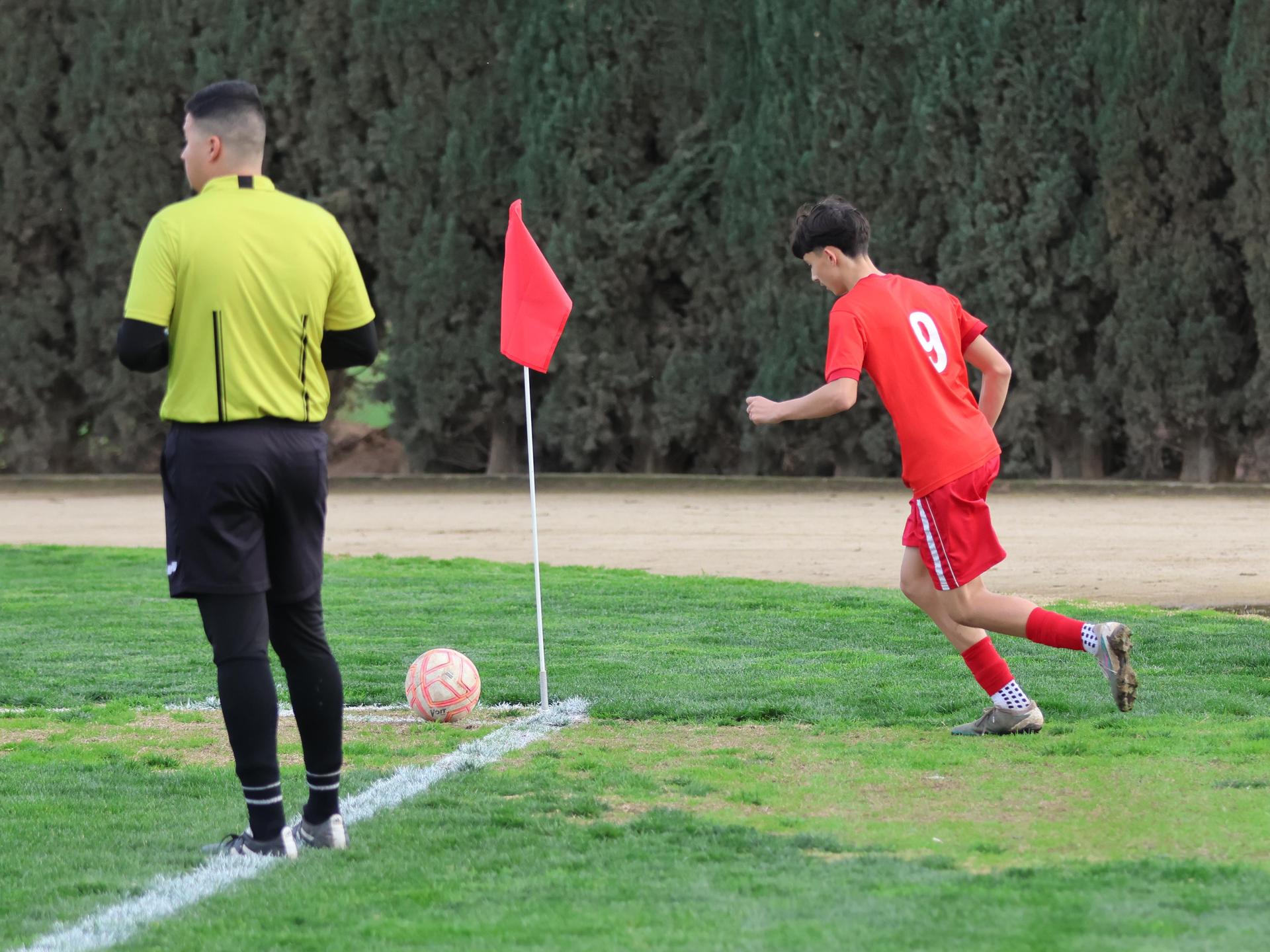 junior varsity boys playing soccer against washington union