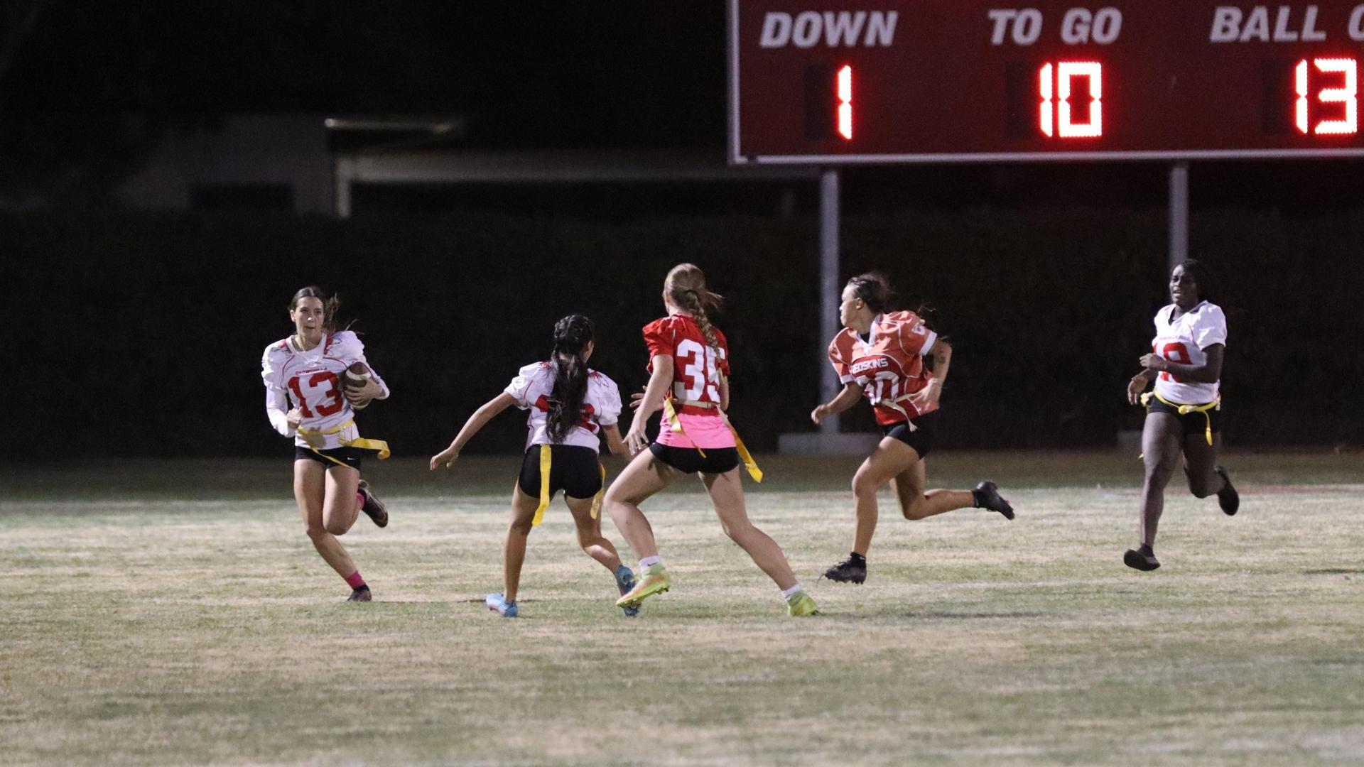 girls playing flag football