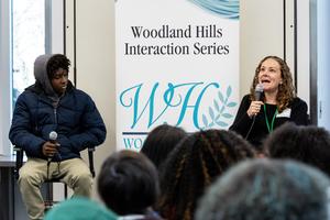 Clare Beams answers a question from a student