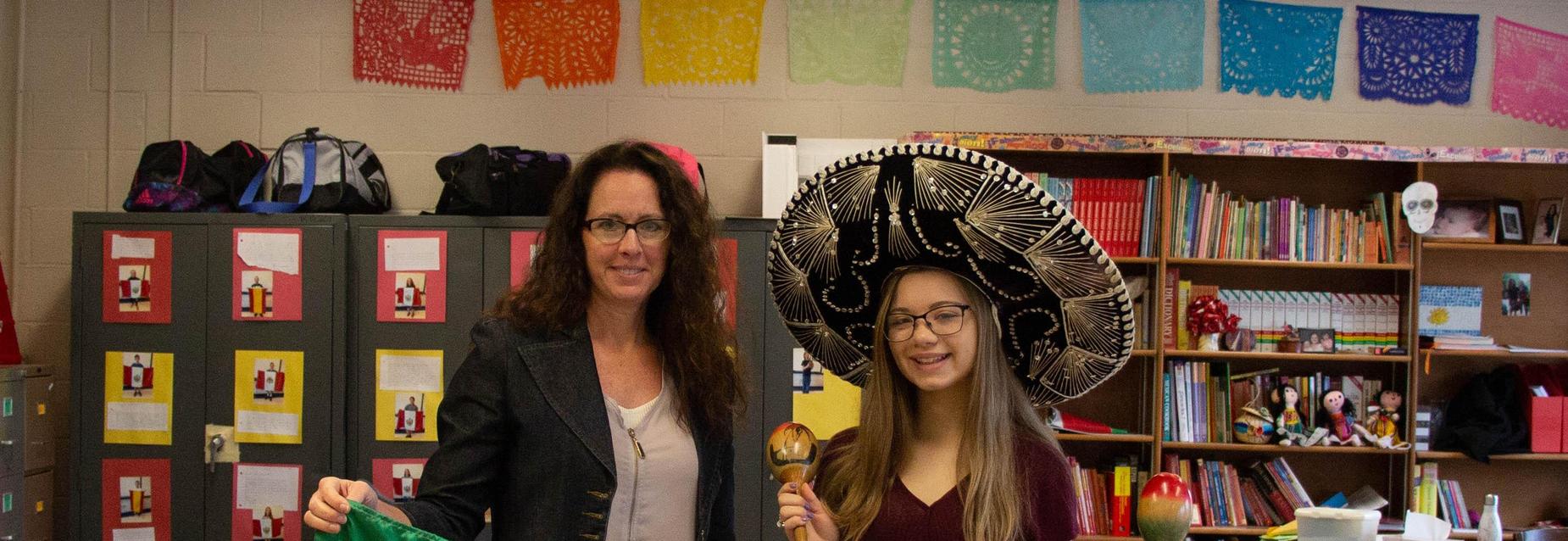 Spanish classroom teacher and female student