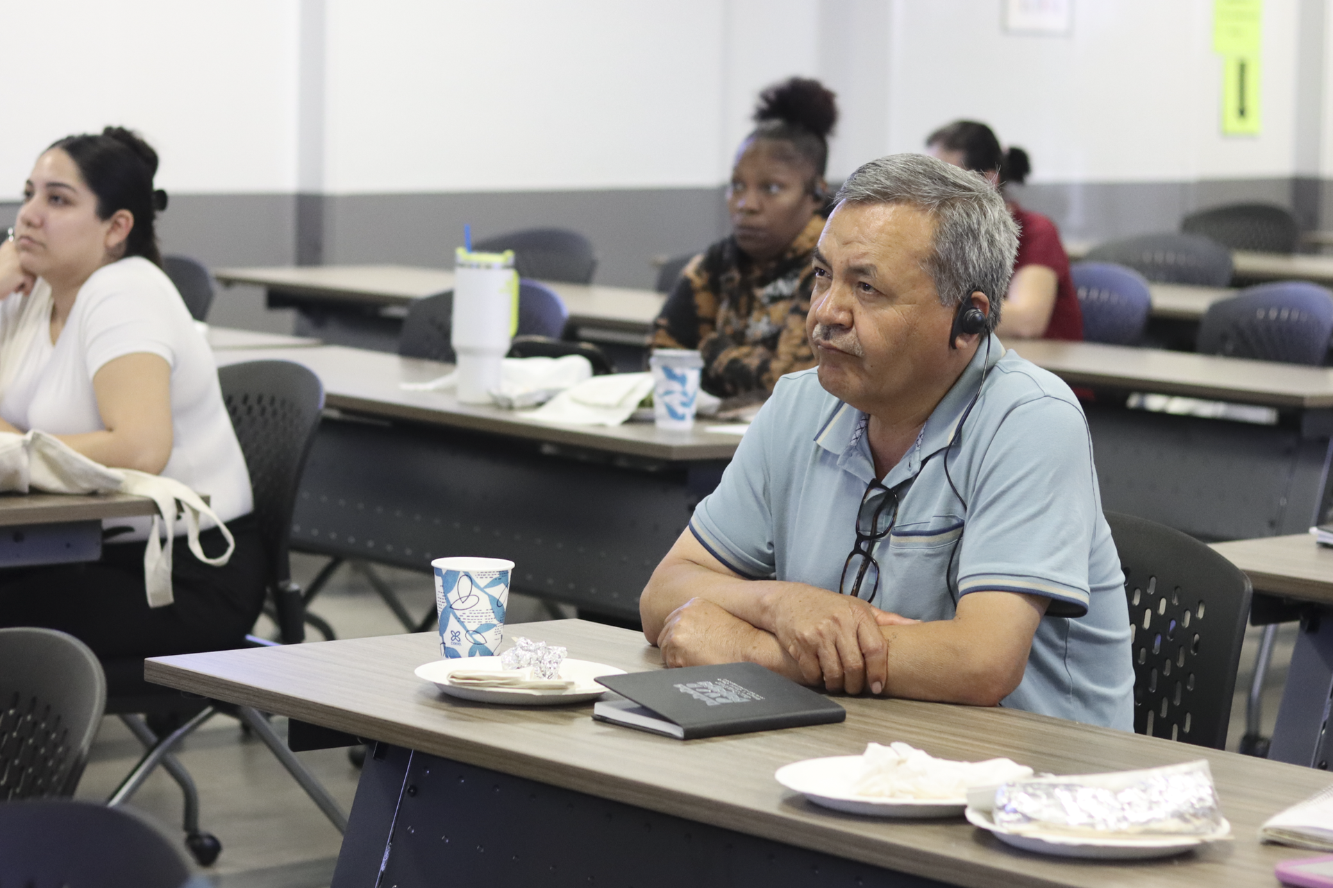 attendee using translation device