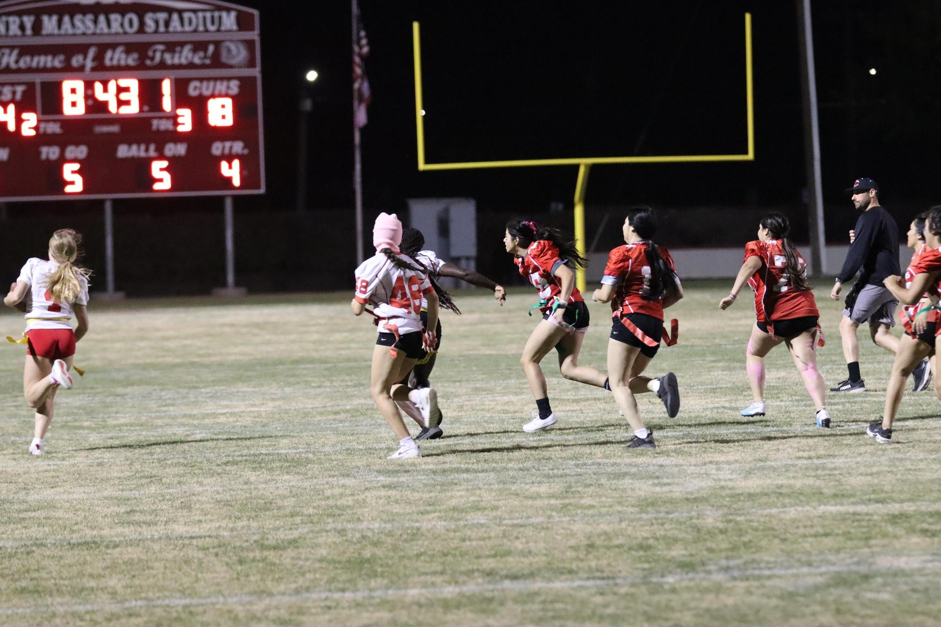 girls playing flag football