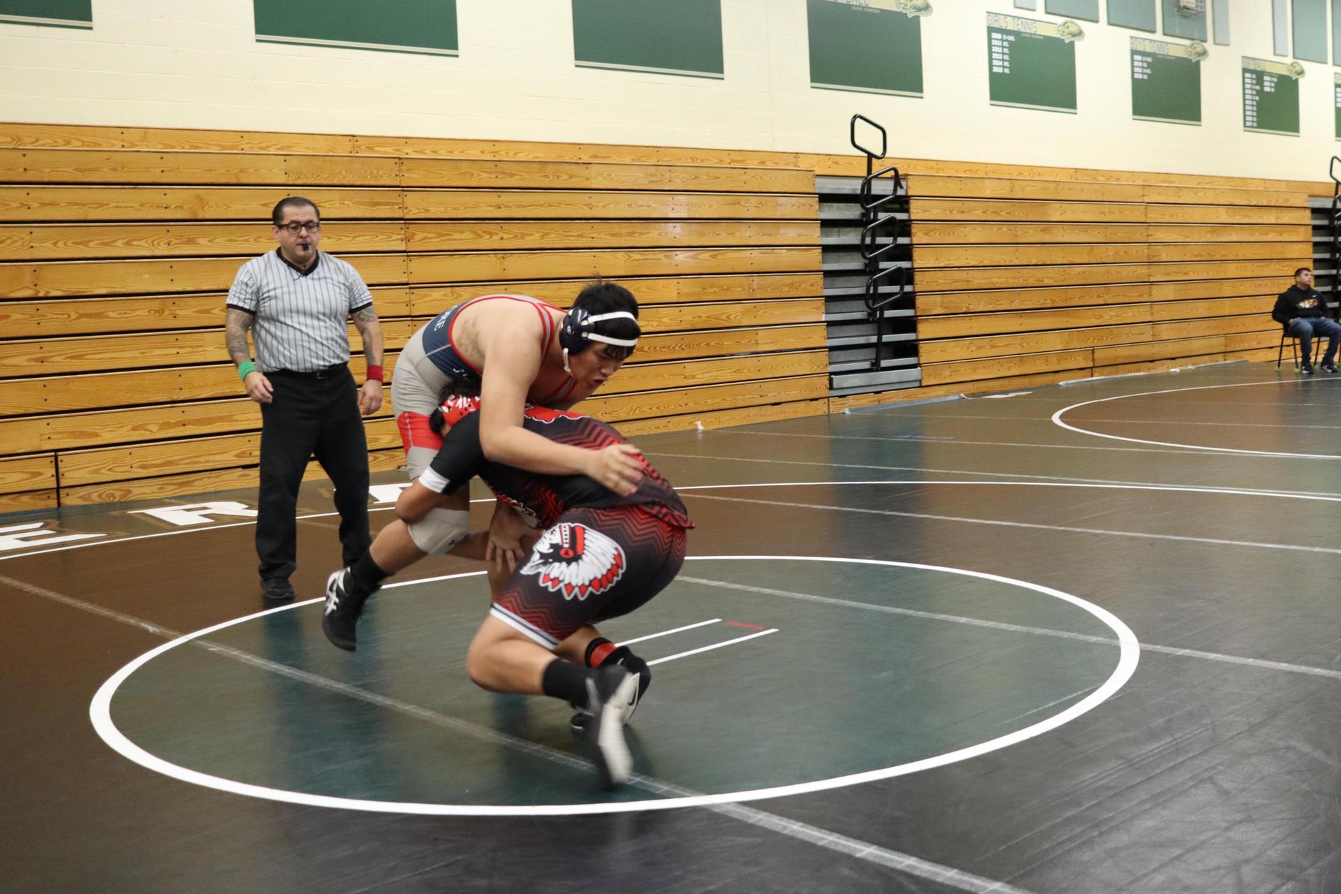 wrestlers in action at the Hawks invitational