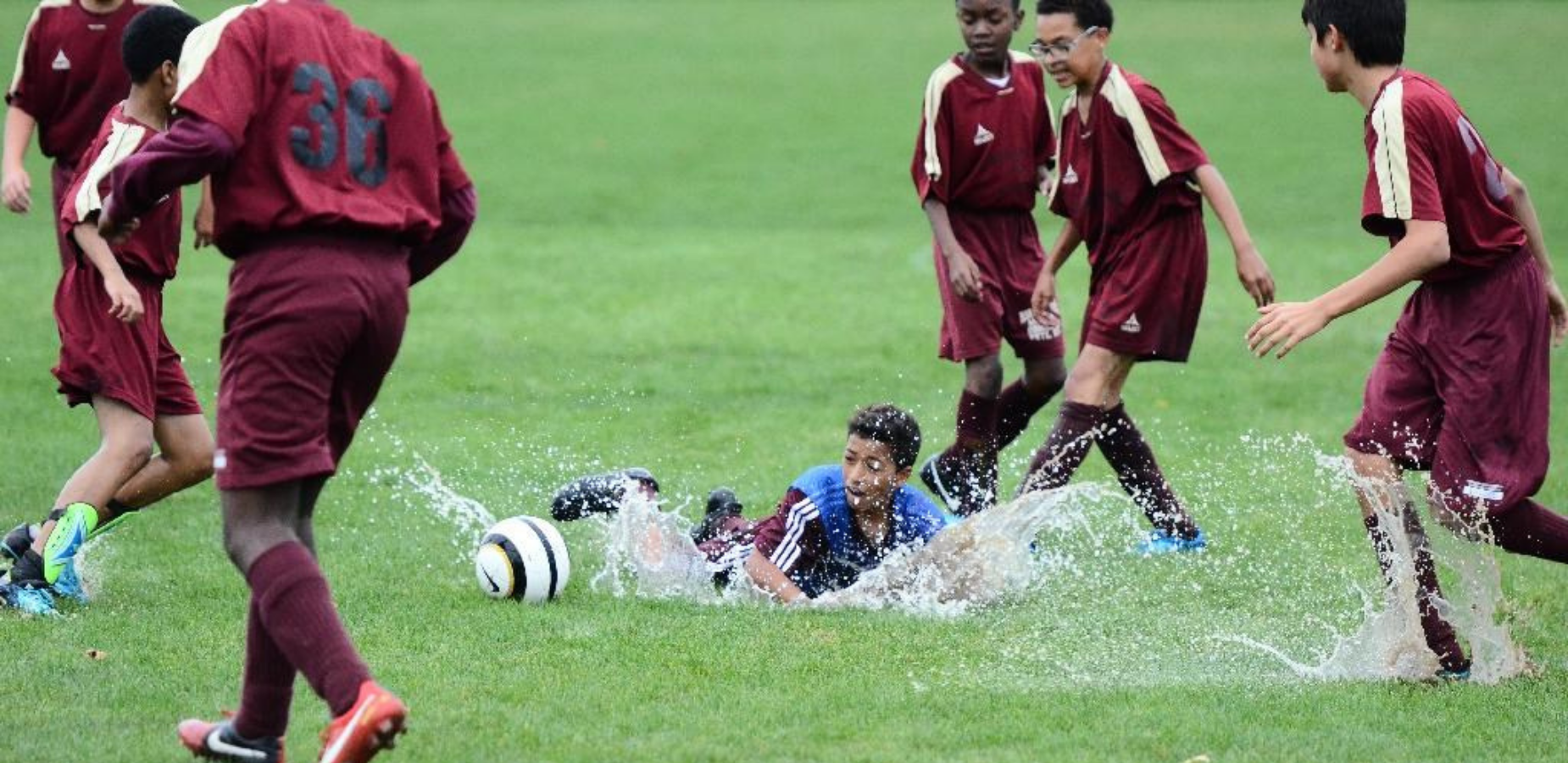 students playing soccer