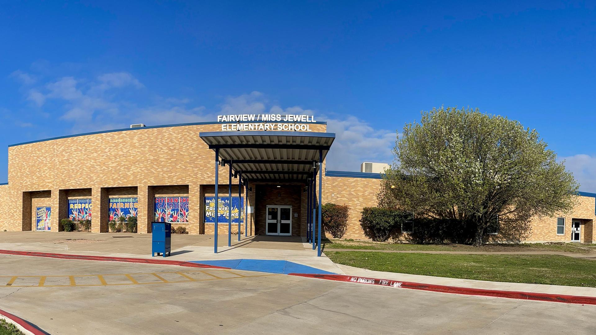 Exterior view of Fairview-Miss Jewell Elementary School with blue sky.