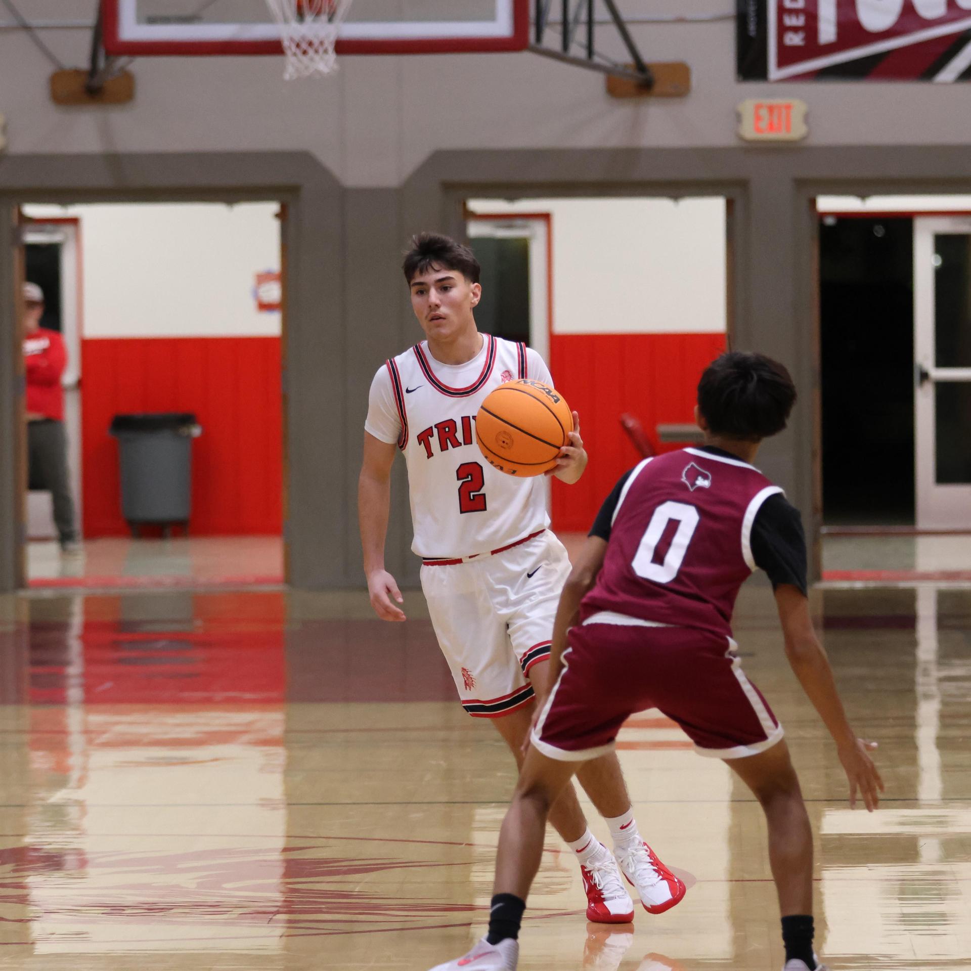 Varsity Boys Basketball playing vs. Orosi 64