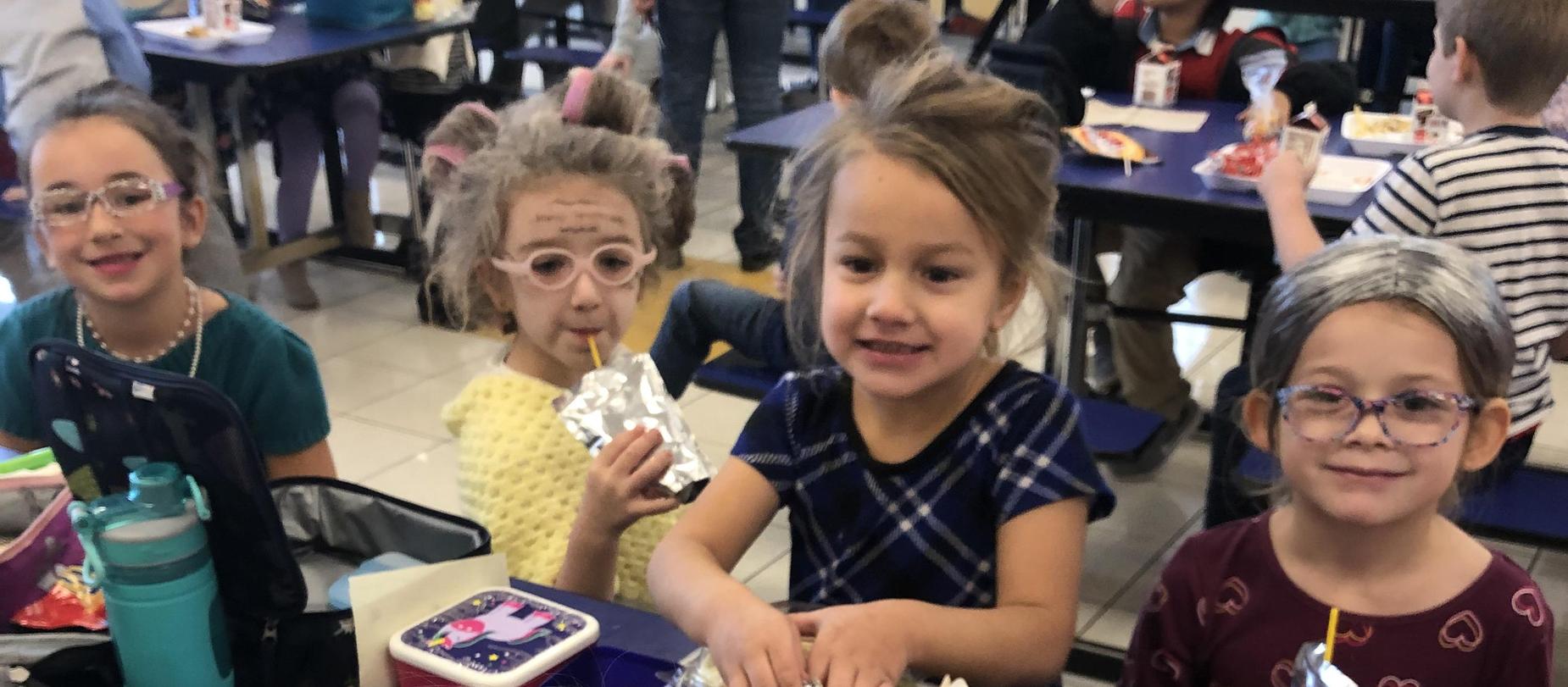 girls dressed as 100 year old