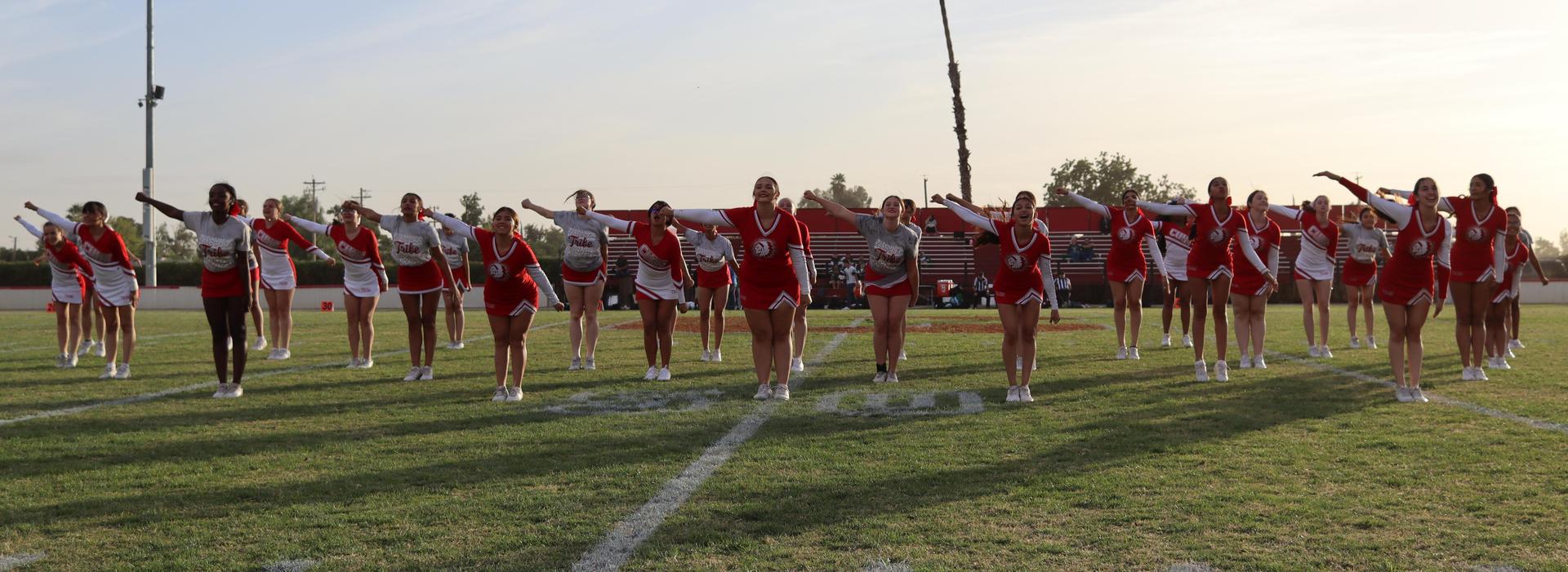 Cheerleaders performing at the football game