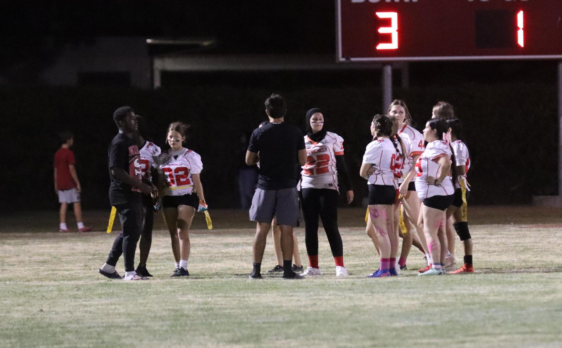 girls playing flag football