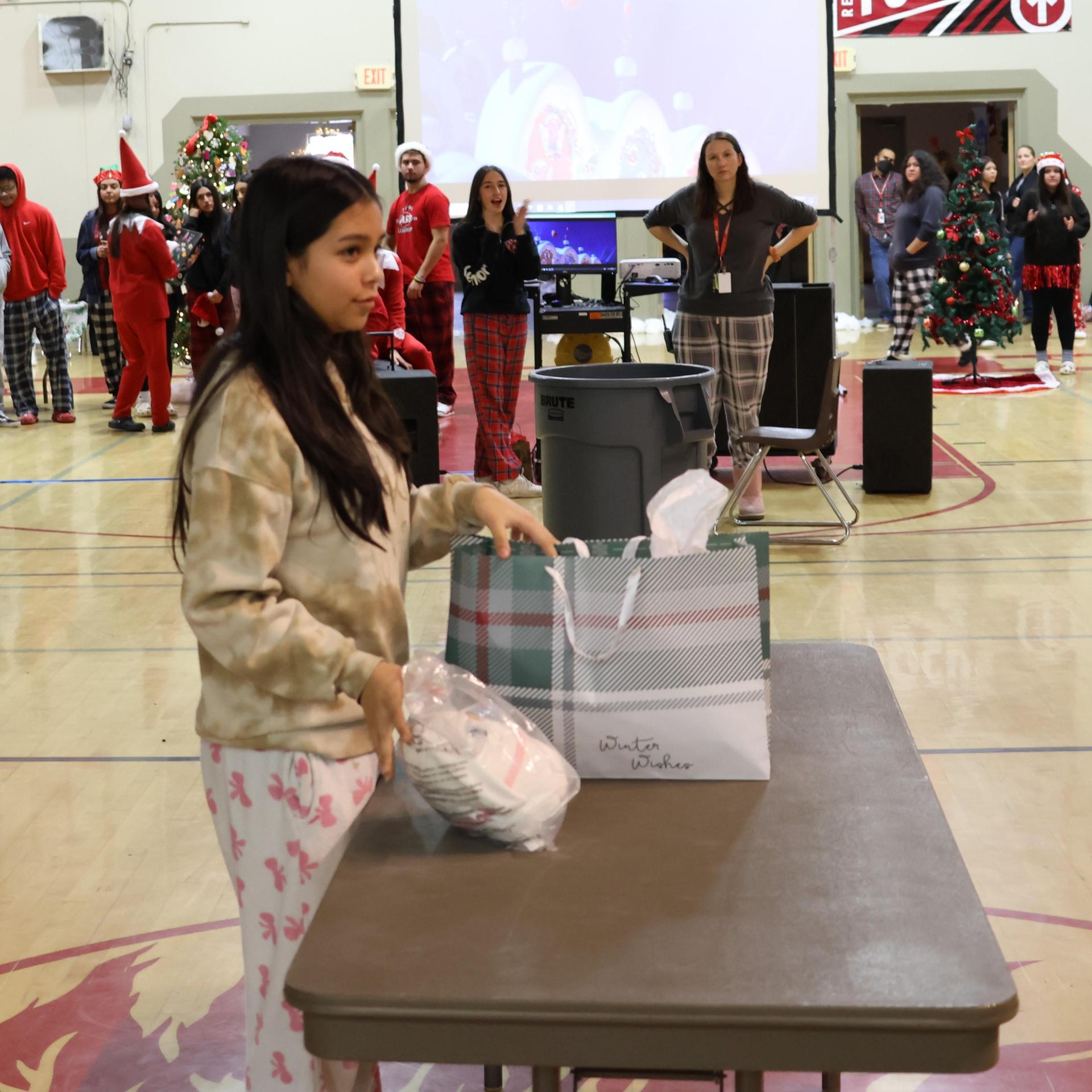 students receiving gifts