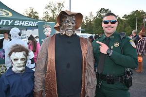 Image of Deputy and children