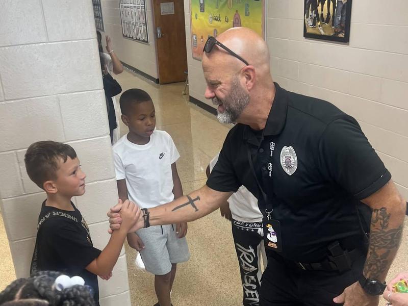 Director of Security, Officer Jeff Wallace, gets to know students at FSES