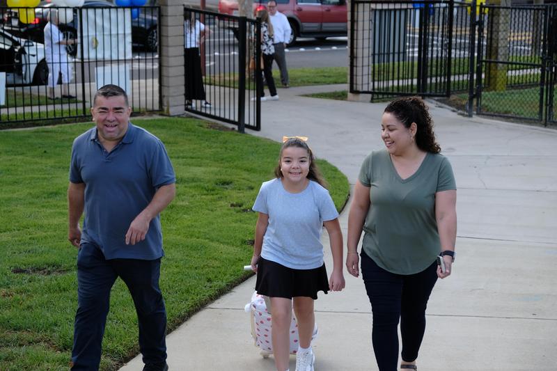 familly walking on path