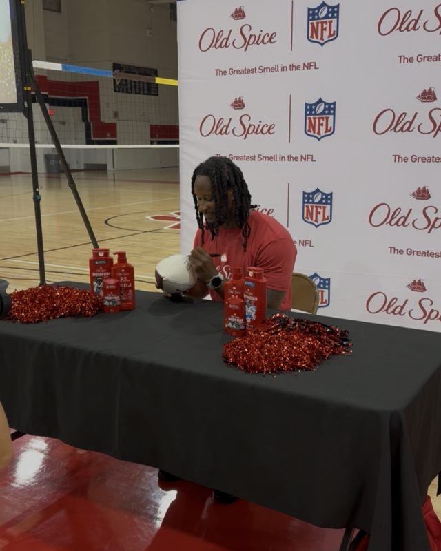 NFL Pro Todd Gurley signs footballs