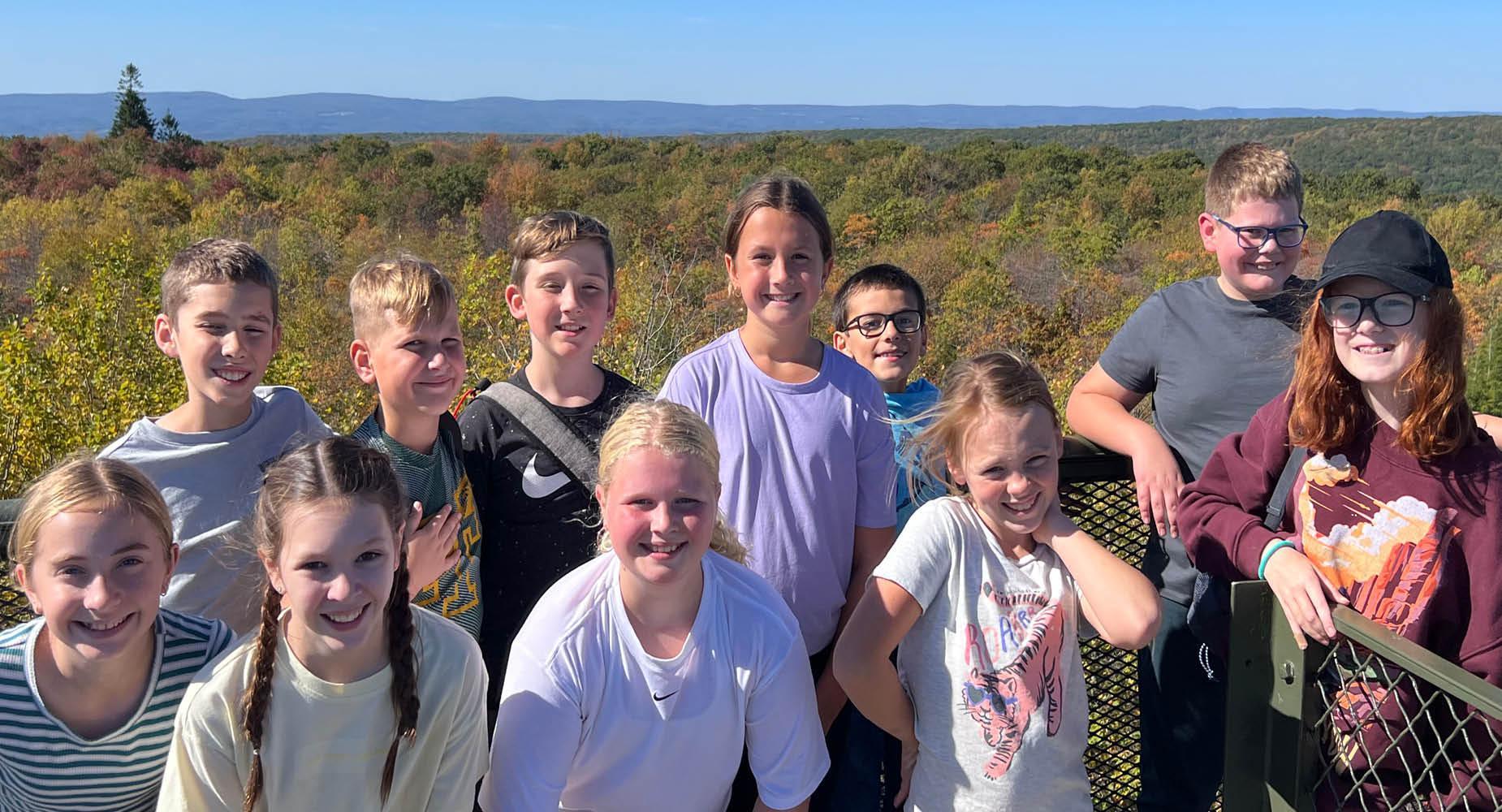 5th-graders from McCullough Elementary School gather at the lookout point at Deer Valley Camp.