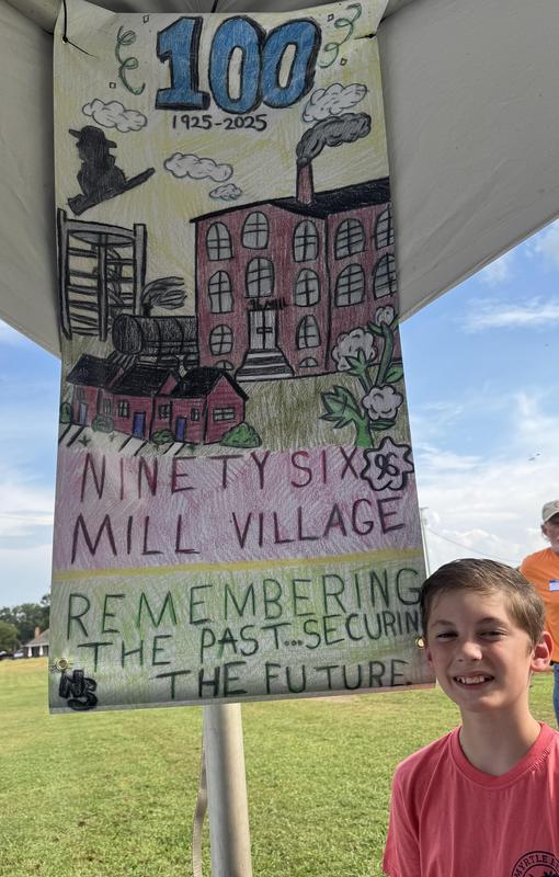 student with banner