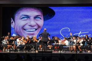 The band and orchestra perform together