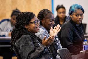 A student speaks during the forum