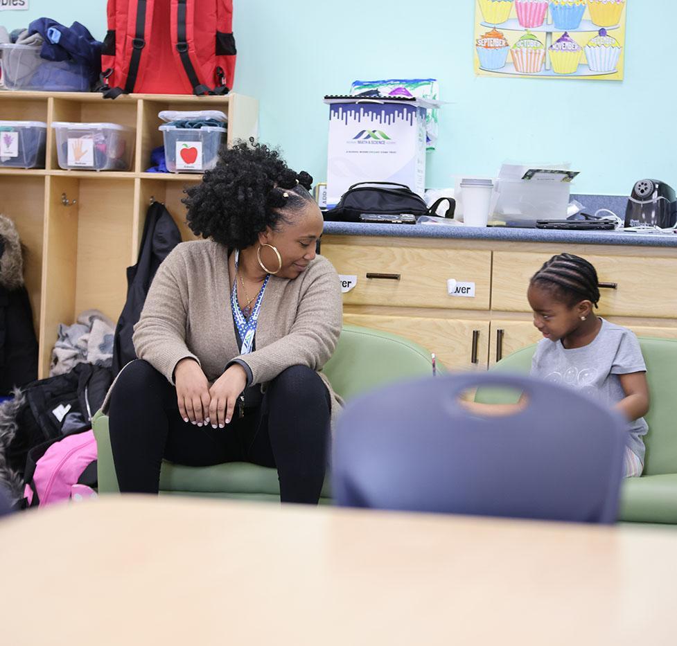 MMSA teacher and student sitting in a classroom