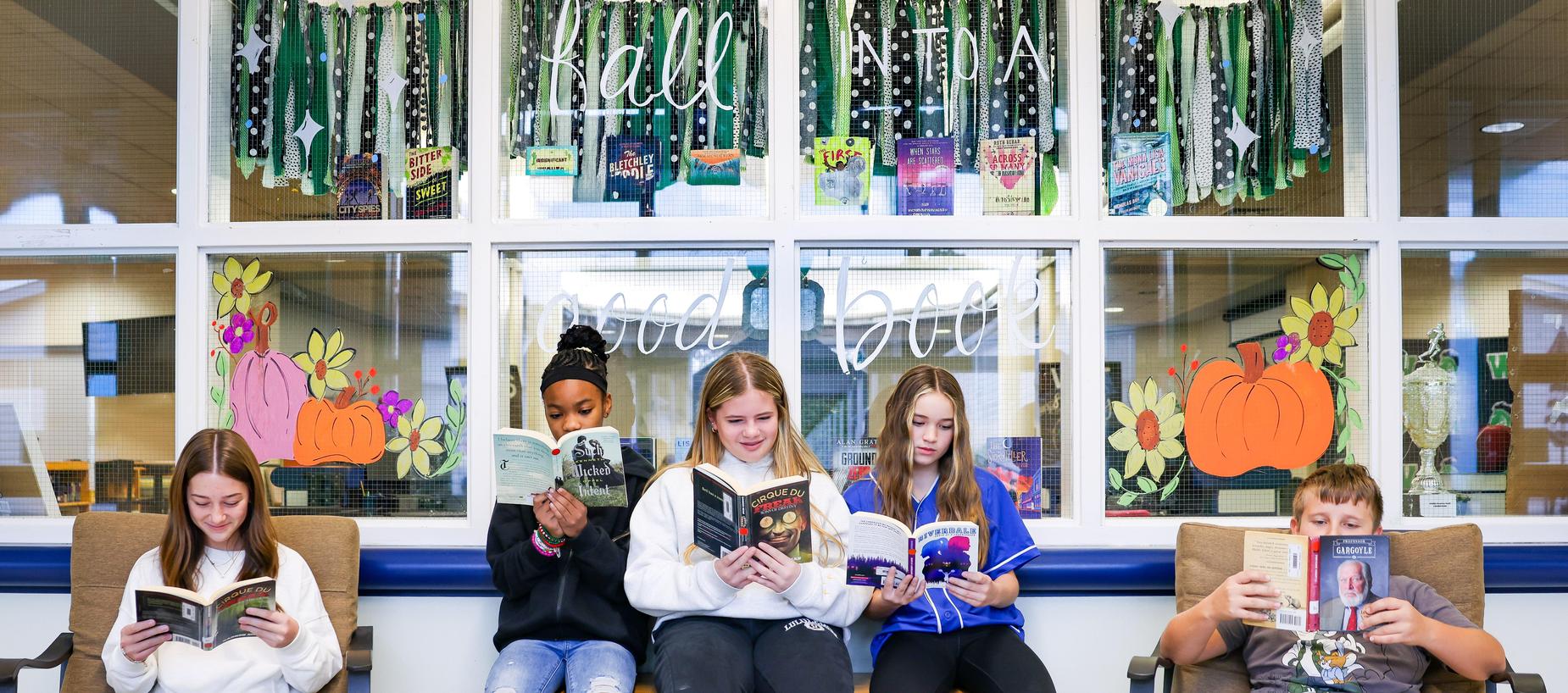 Students reading outside the media center.
