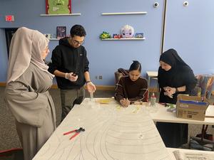 Our CYSP students have been hard at work bringing their mural project to life in the library!